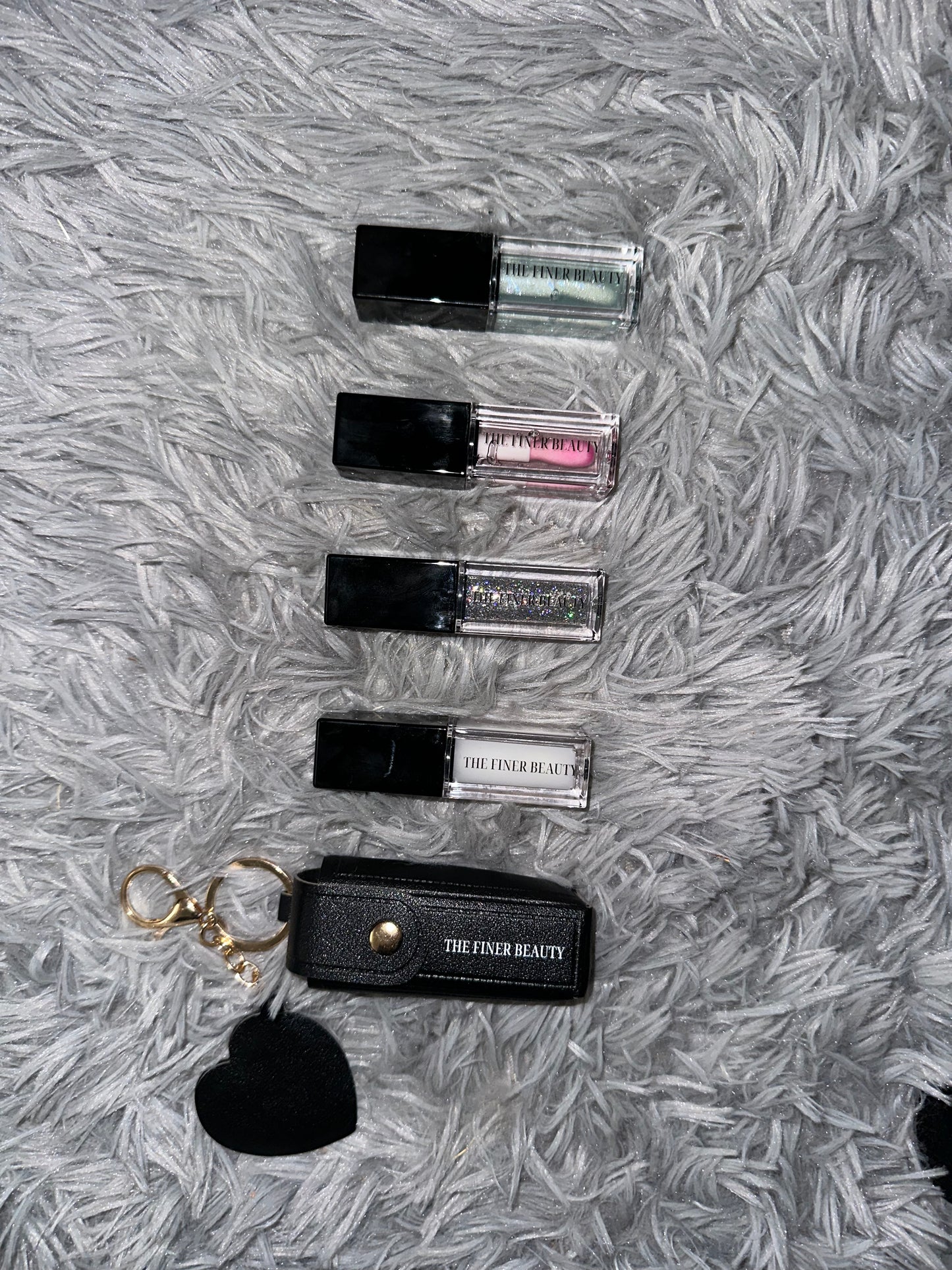 Lip oil with keychain holder, and tiny heart mirror