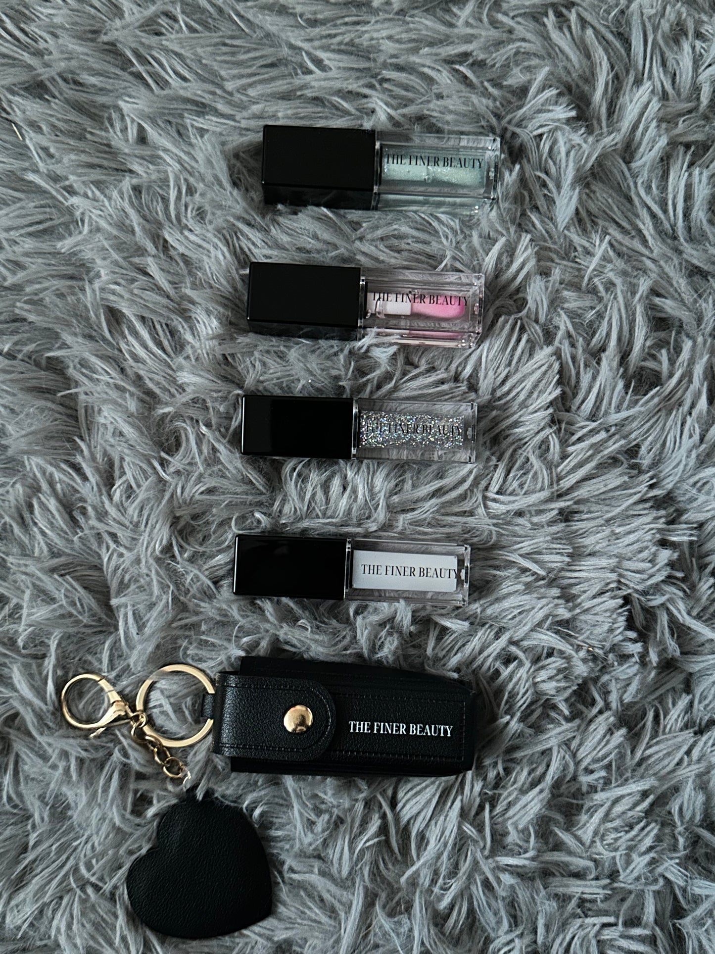 Lip oil with keychain holder, and tiny heart mirror